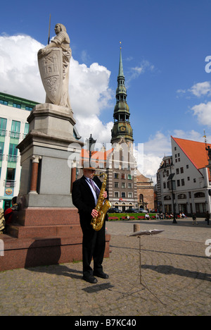 Street saxophone player, Vecriga, Riga`s Old City, Latvia Stock Photo